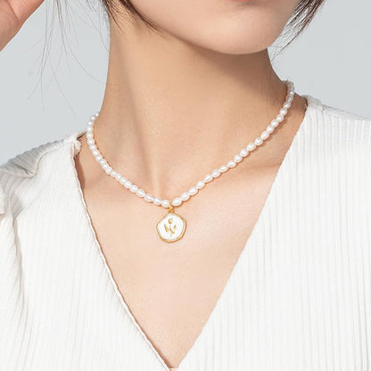 Dollcini Pearl Ékszerkészlet – Nyaklánc és Gyöngy Fülbevaló