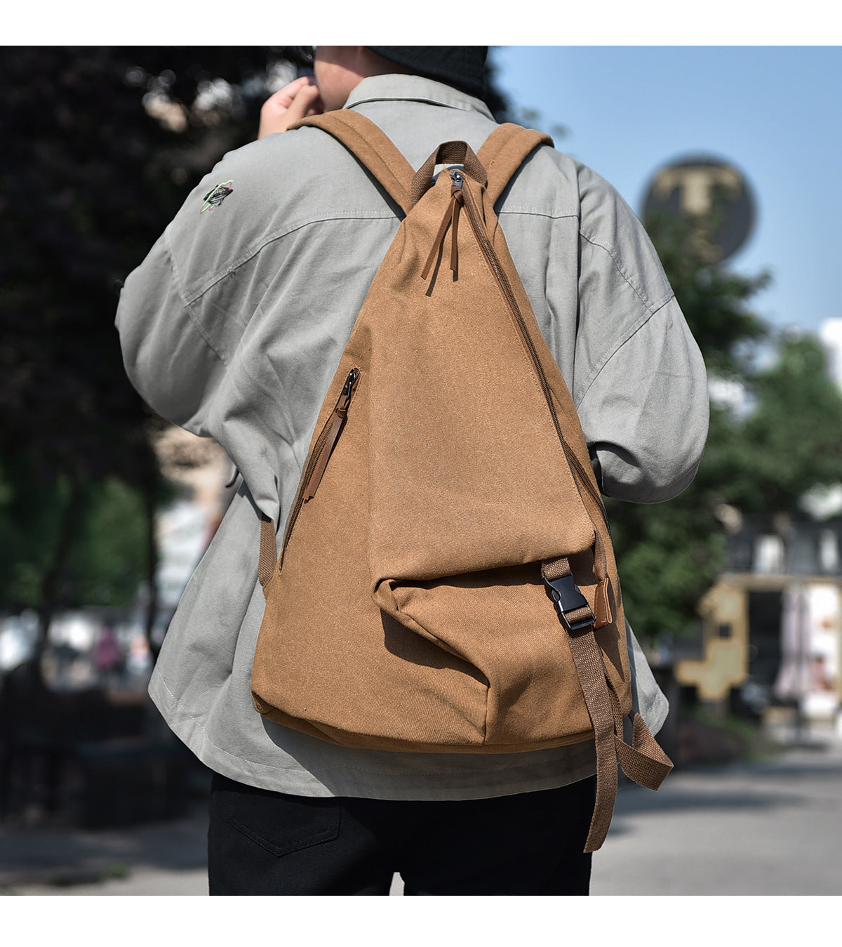 Geantă de umăr unisex Dollcini – Fabricată din material textil ușor și durabil, potrivită pentru uz zilnic, atât pentru bărbați, cât și pentru femei.