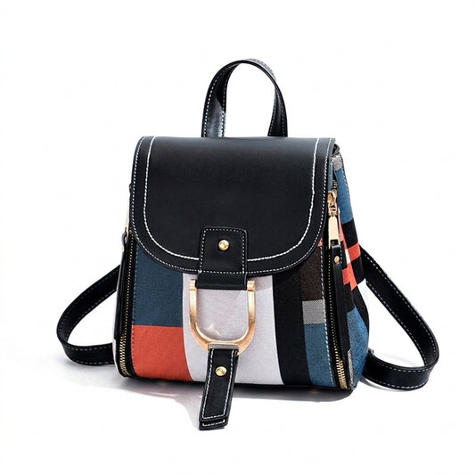 black patchwork compact women’s backpack, front view, with flap closure