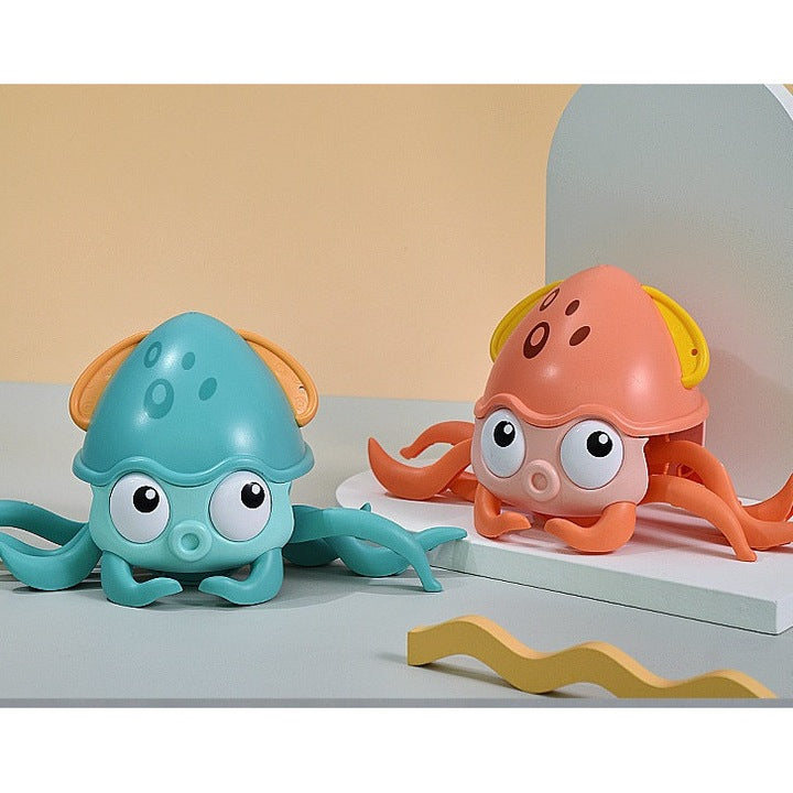 Dollcini Zenélő Mászó Polip Játék – LED Fényekkel, USB-s